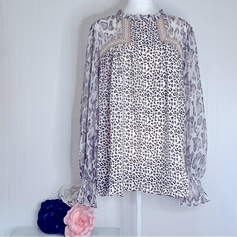animal print chiffon top, frilled neckline and elegant long poet sleeves.